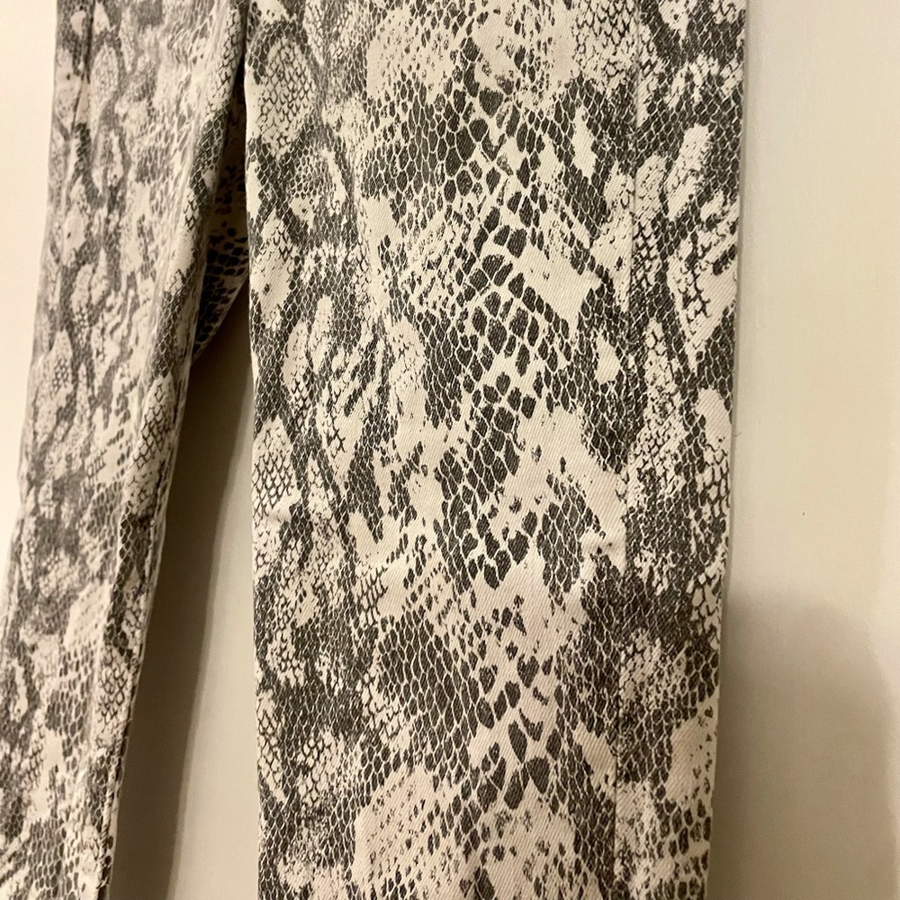 Snakeskin skinny jeans